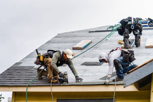 Professional Gutter Installation technician working in Center Point, TX